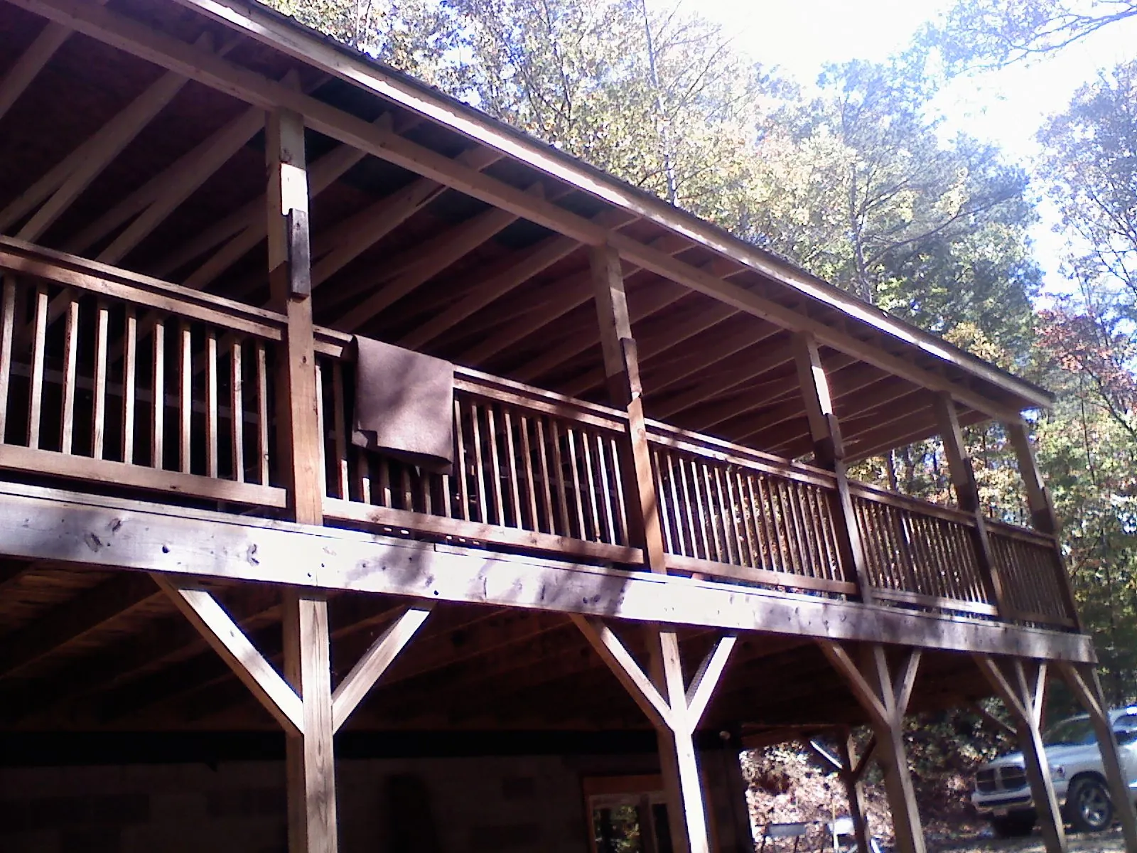 Timber framing under a new elevated porch and deck — Roof Leak Repair in Byfield by Roofing Brothers